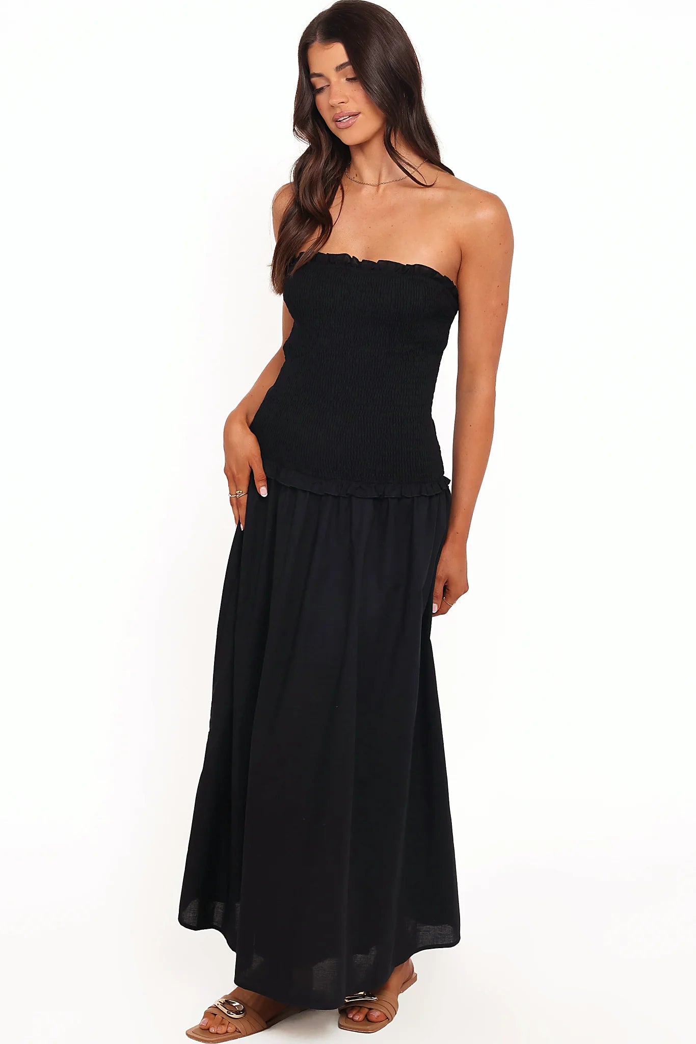 Elasticised shirred body of the black linen dress
