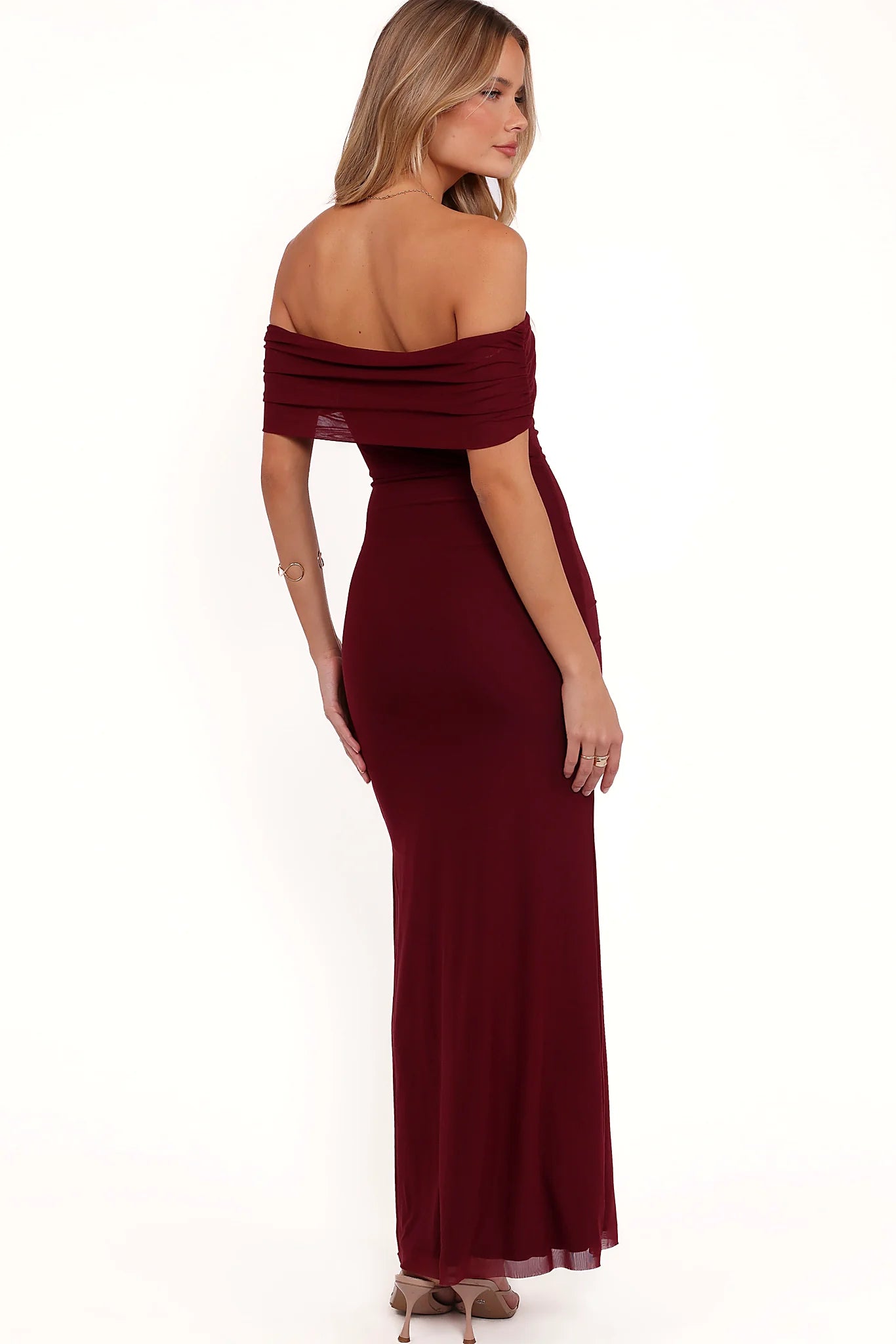 Mesh overlay across the burgundy maxi dress