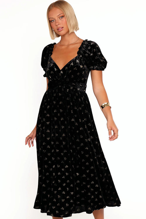 V neckline opening into puff sleeves