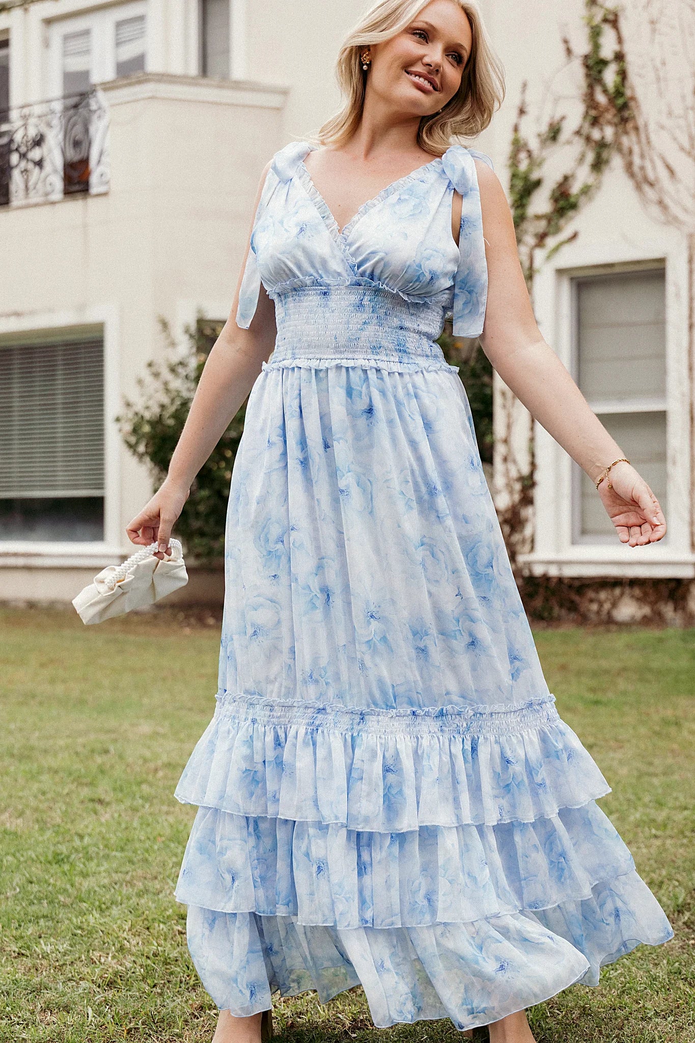 Shirred and ruffled bodice with tie close straps