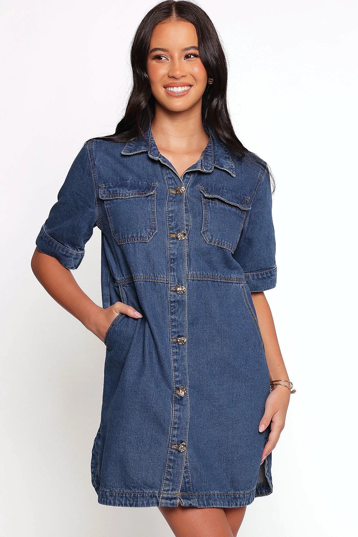 Denim shirt mini dress photographed from the front