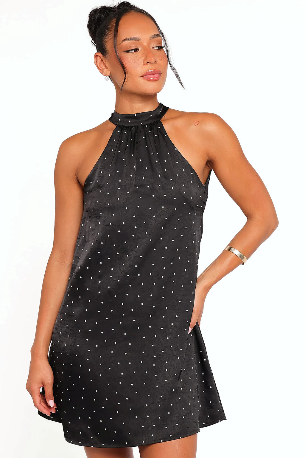 Black polka dot backless mini dress, front view