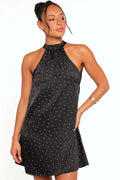 Black polka dot backless mini dress, front view