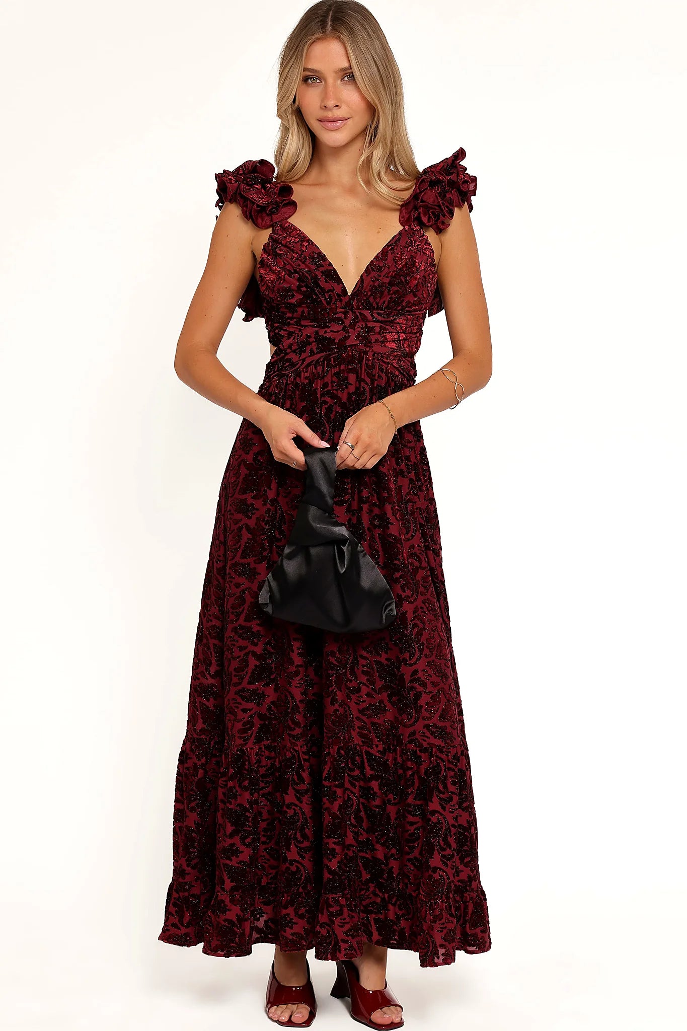 V neckline held by non-adjustable straps