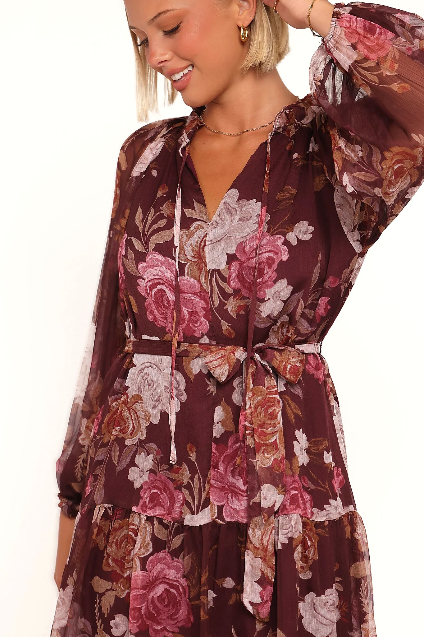 Burgundy floral tie neck mini dress, front view