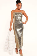Gold sequin slip maxi dress photographed from the front
