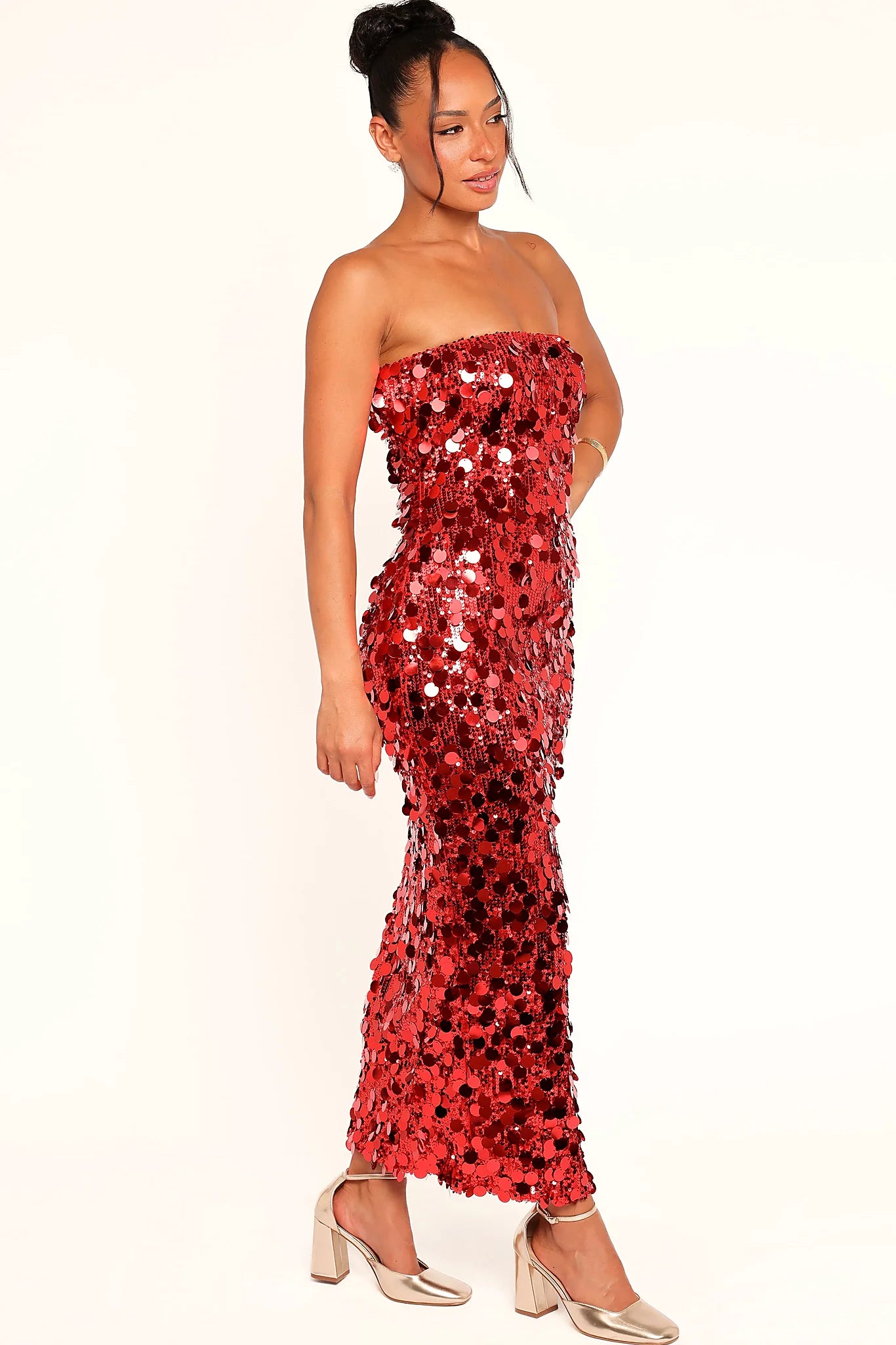 Side split opening on the red sequin dress