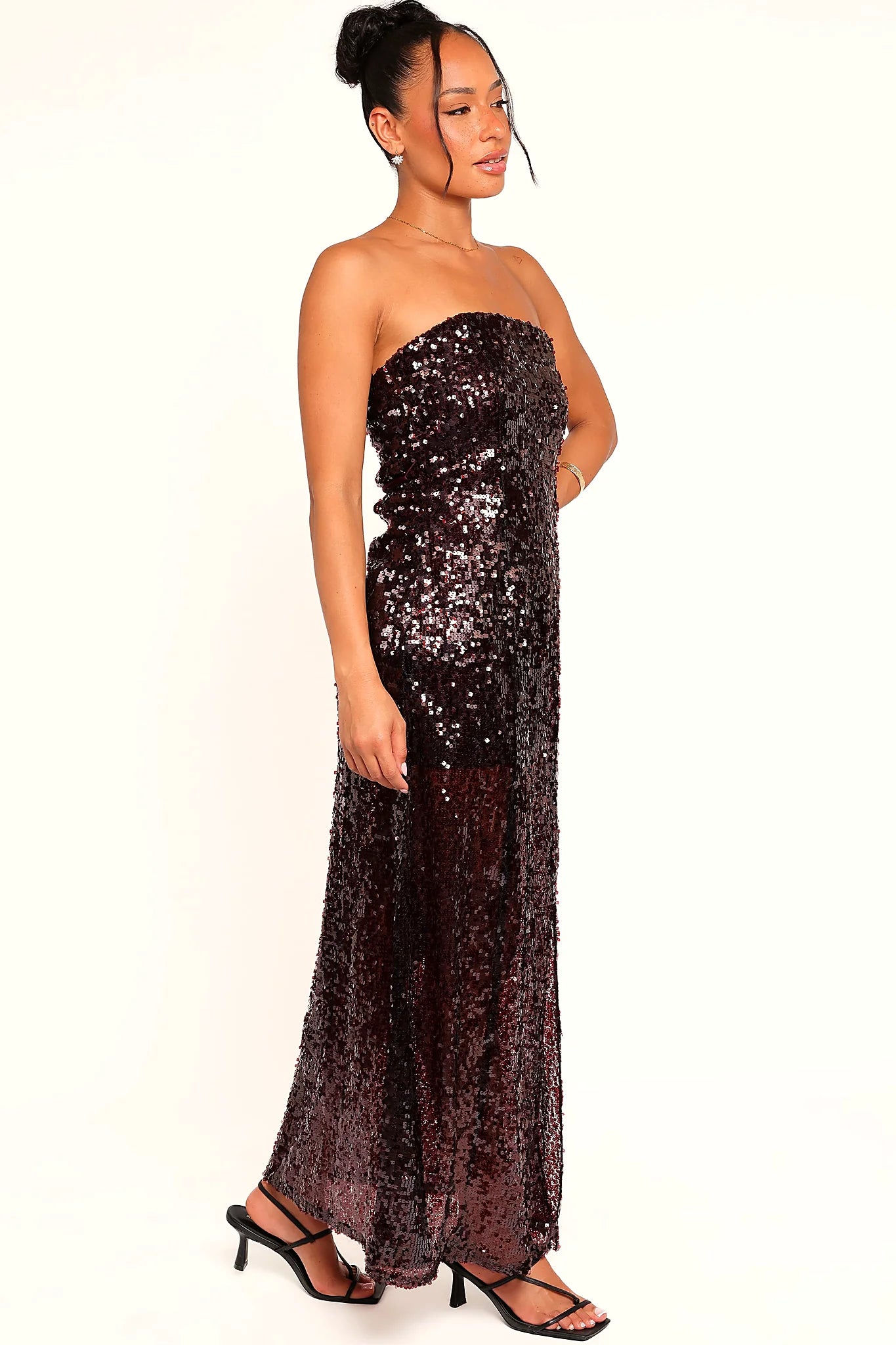 Front split opening on the red sequin maxi
