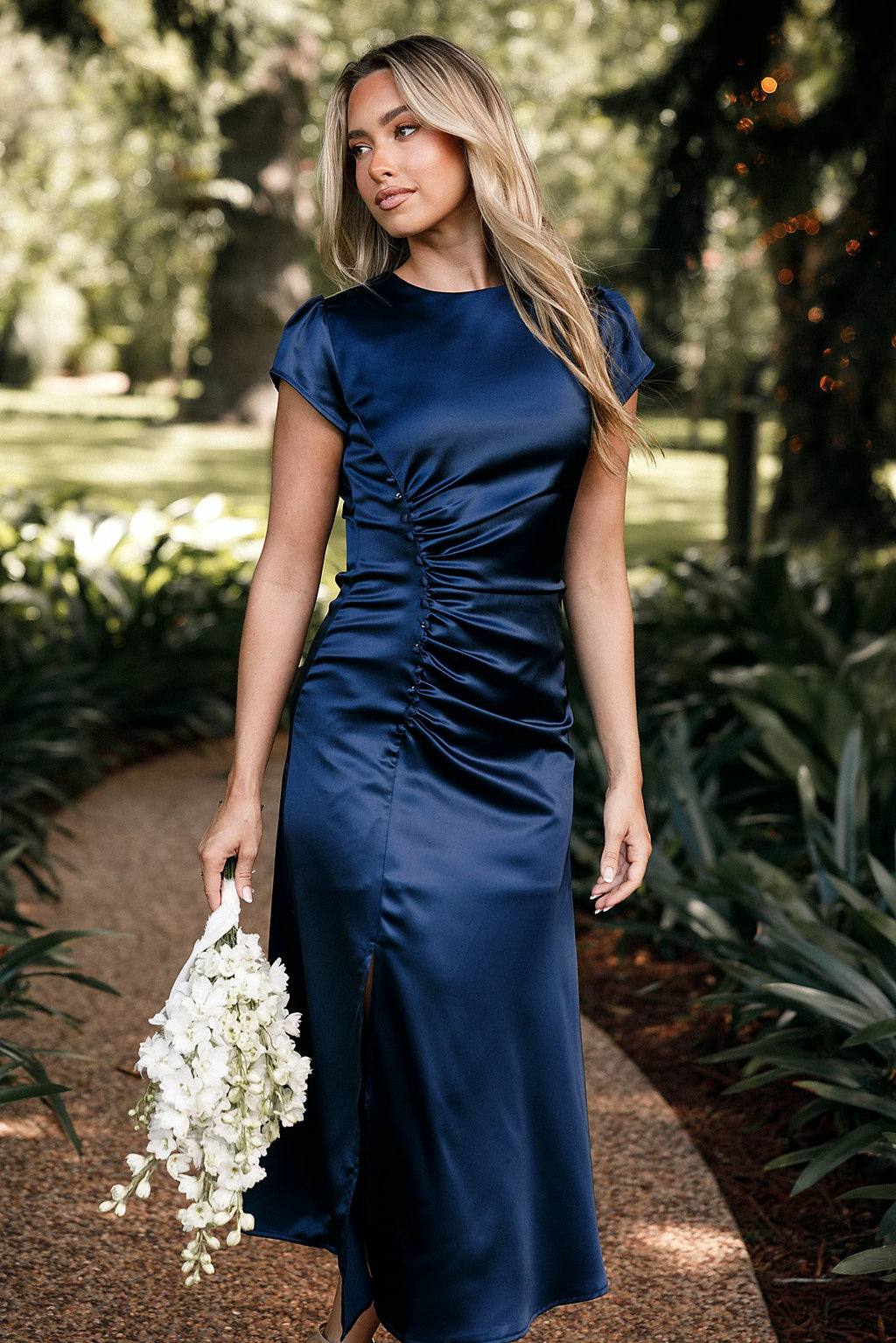 Navy satin midi dress photographed from the front