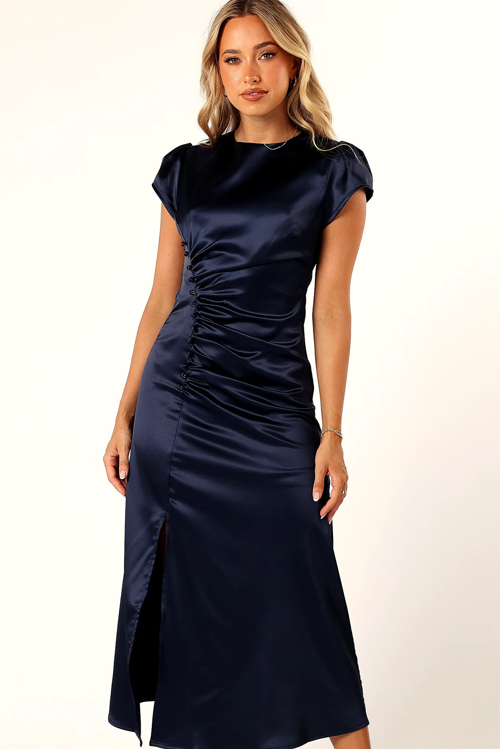 Front buttons and split hem on the navy satin dress