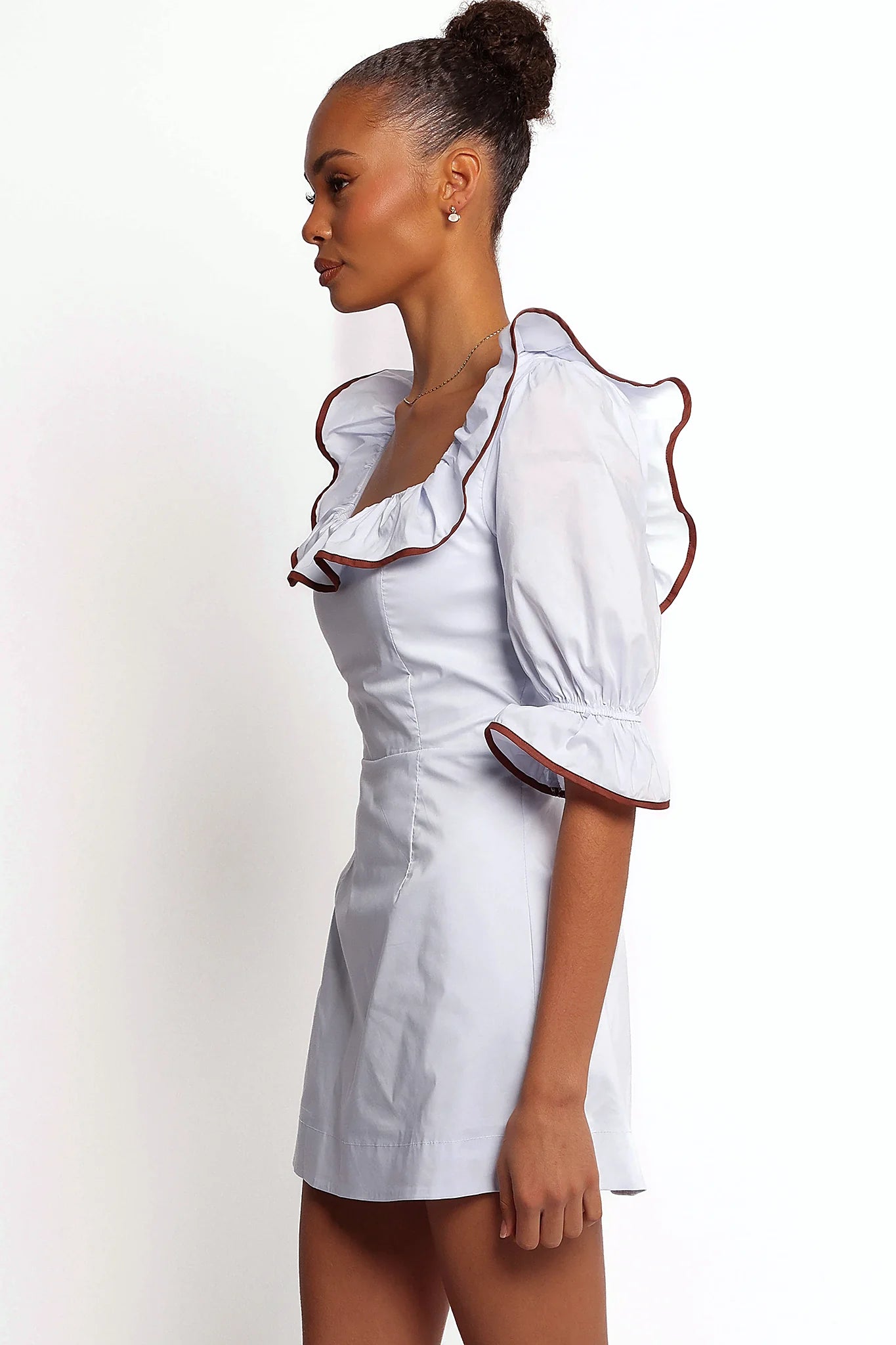 Mid length sleeve finishing in an elasticised ruffle