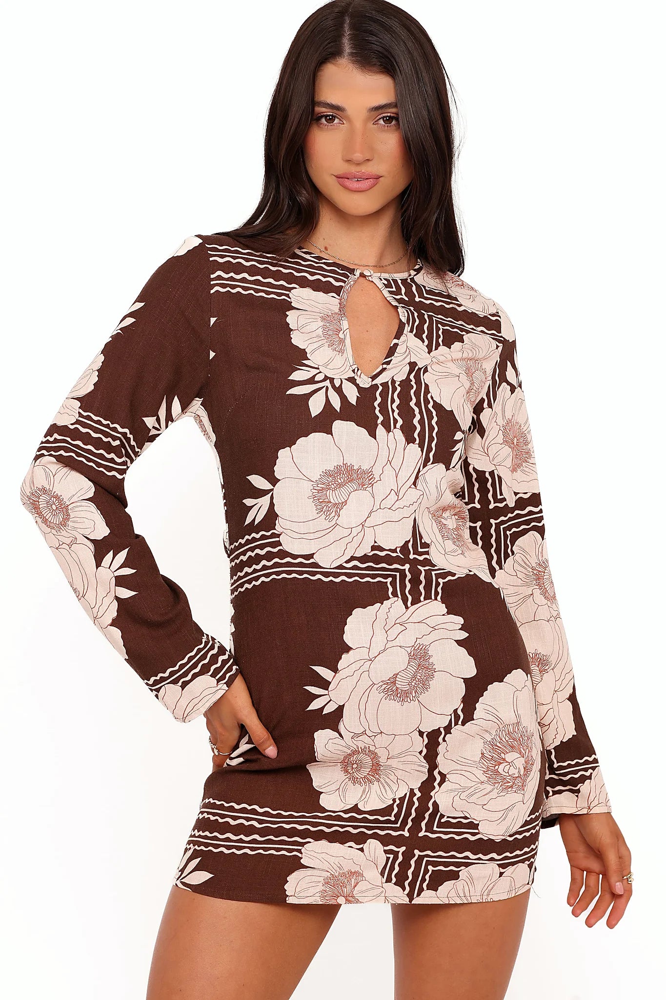 High closed neckline on the brown floral mini