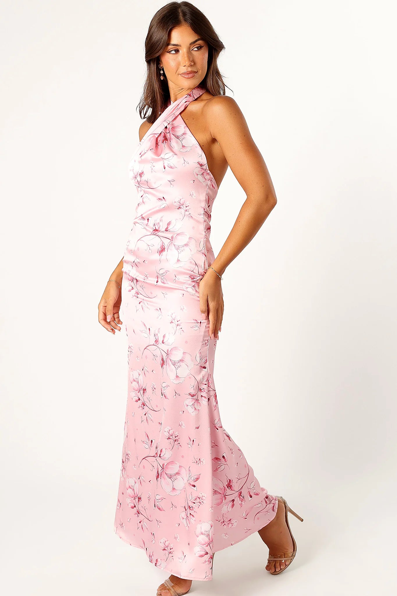 Pink floral halterneck maxi dress photographed from the front