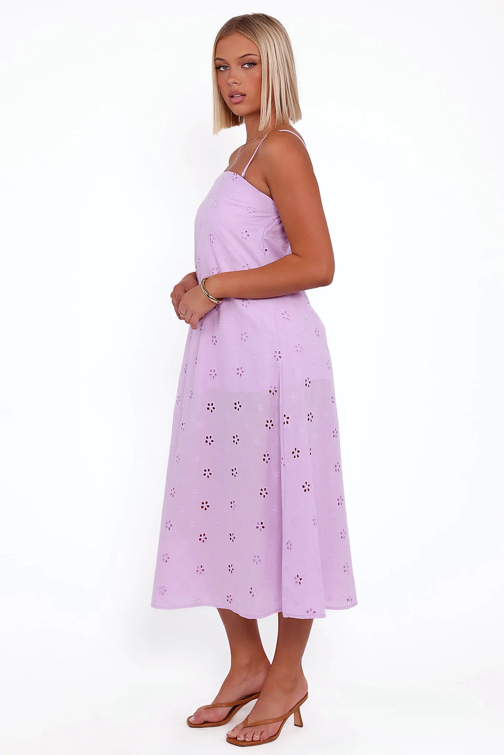 Floral embroidery anglaise worked into the cotton