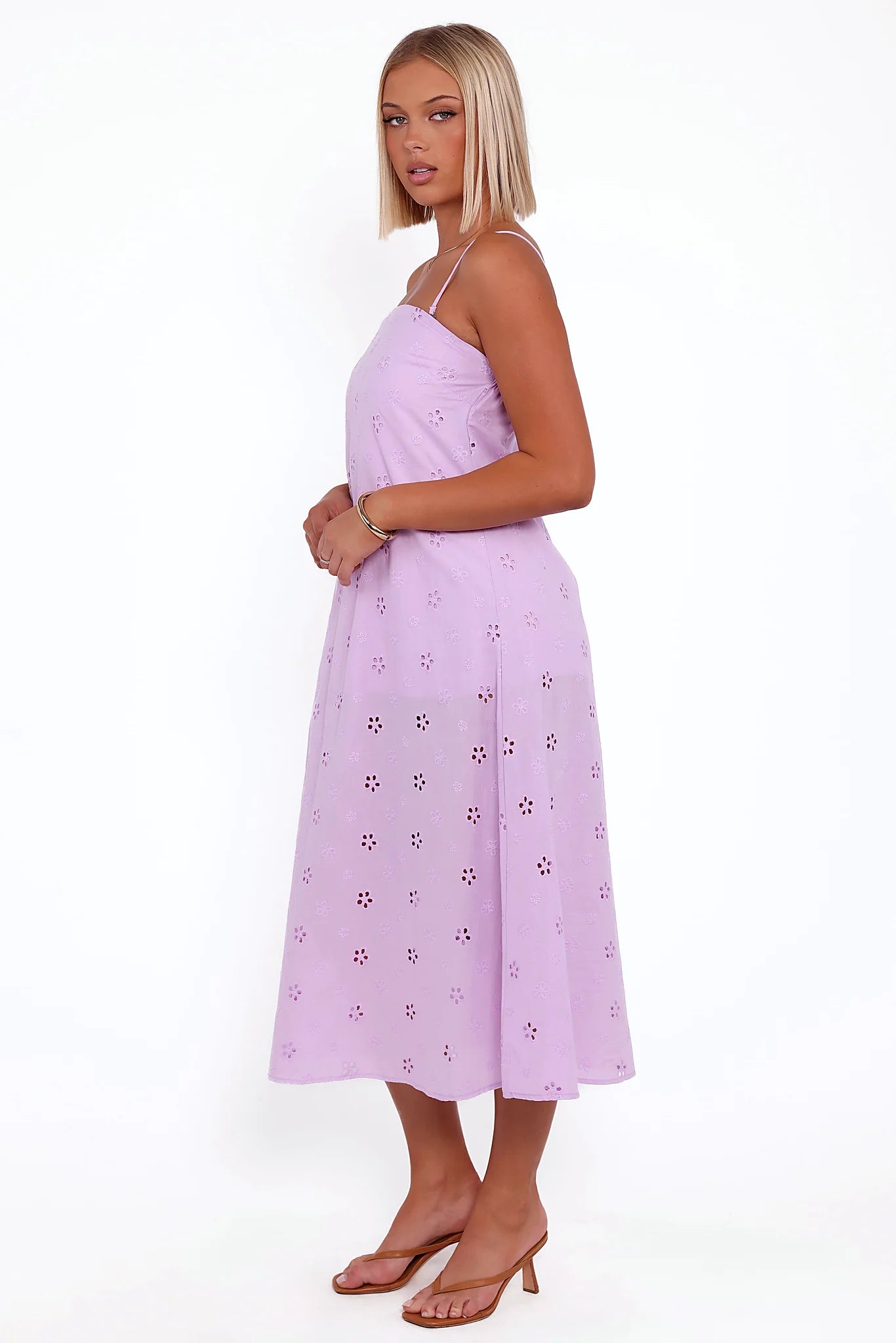 Floral embroidery anglaise worked into the cotton