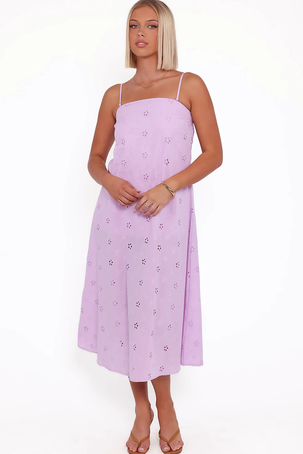 Square neckline across the strapless bodice in lilac