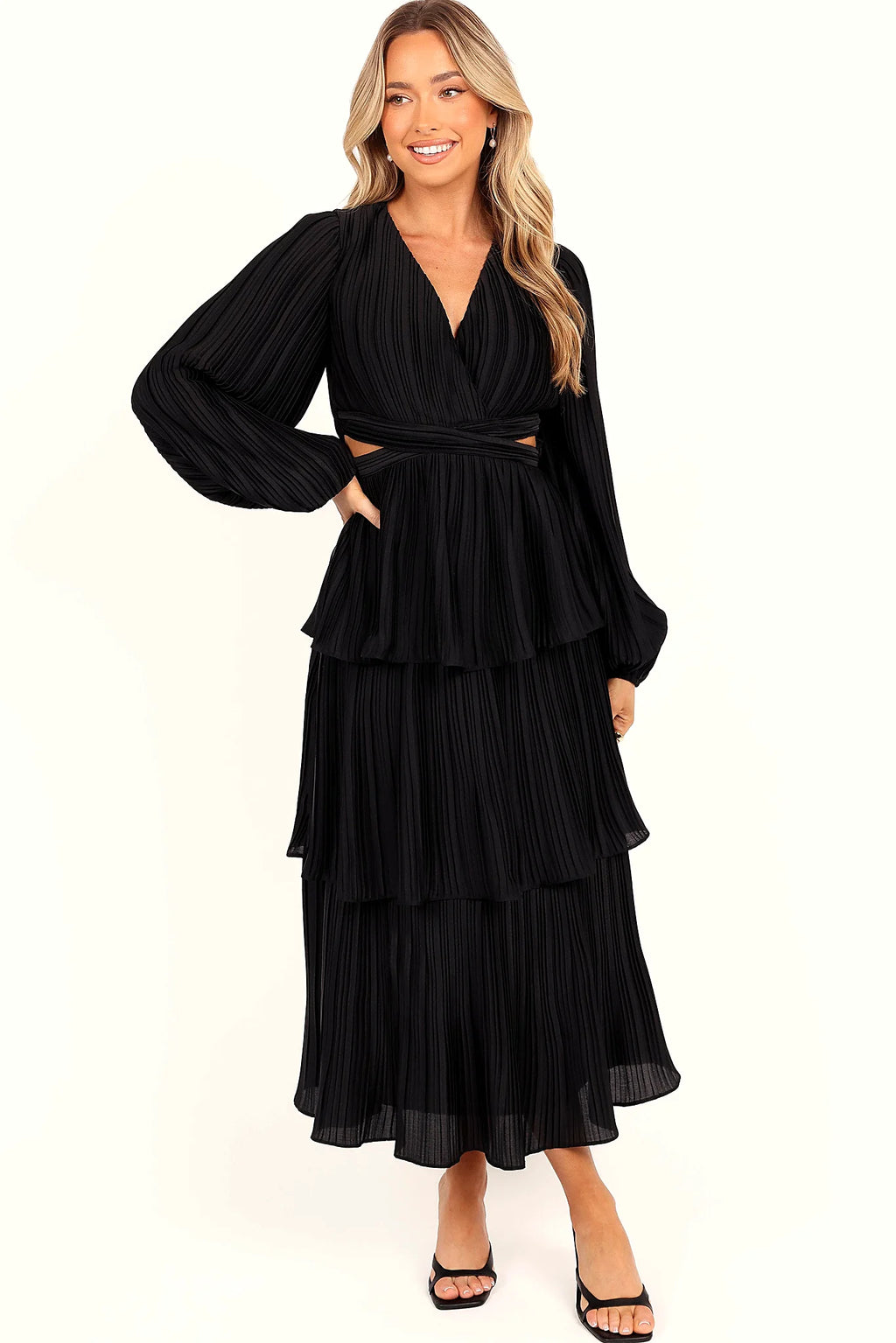 Side cut-out detail on the black long sleeve dress