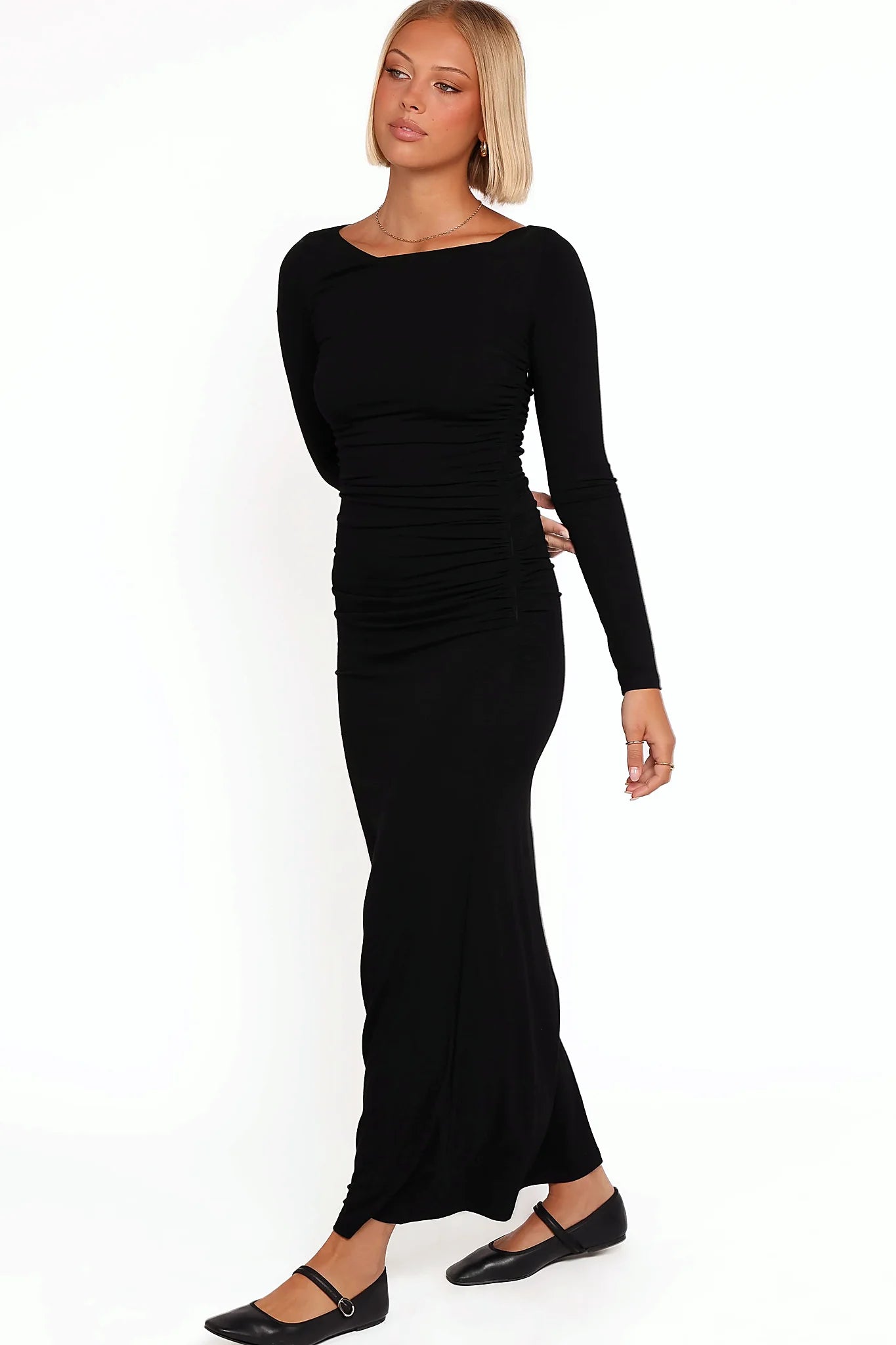 Gathered ruching along the side of the black maxi