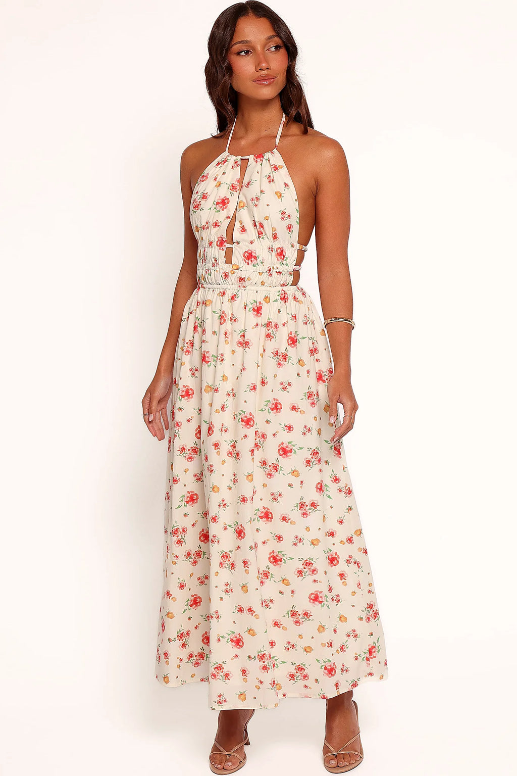 Tie halter neckline leaving the back open